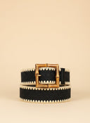 André black woven paper belt with a square bamboo buckle and zigzag trim. Adjustable strap.